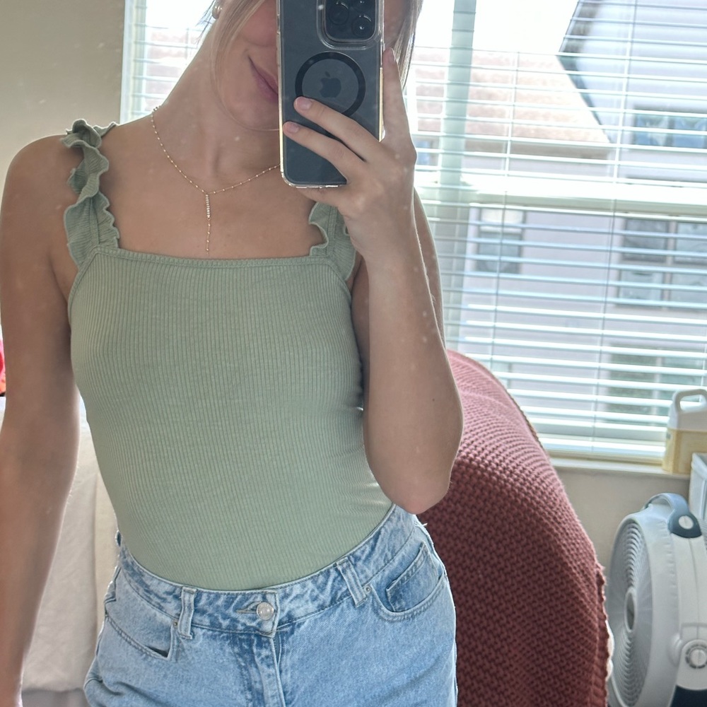 Olive green body suit with ruffled strap